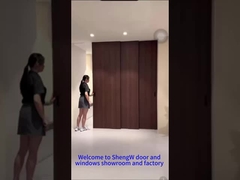 Porte en bois et aluminium à 3 volets